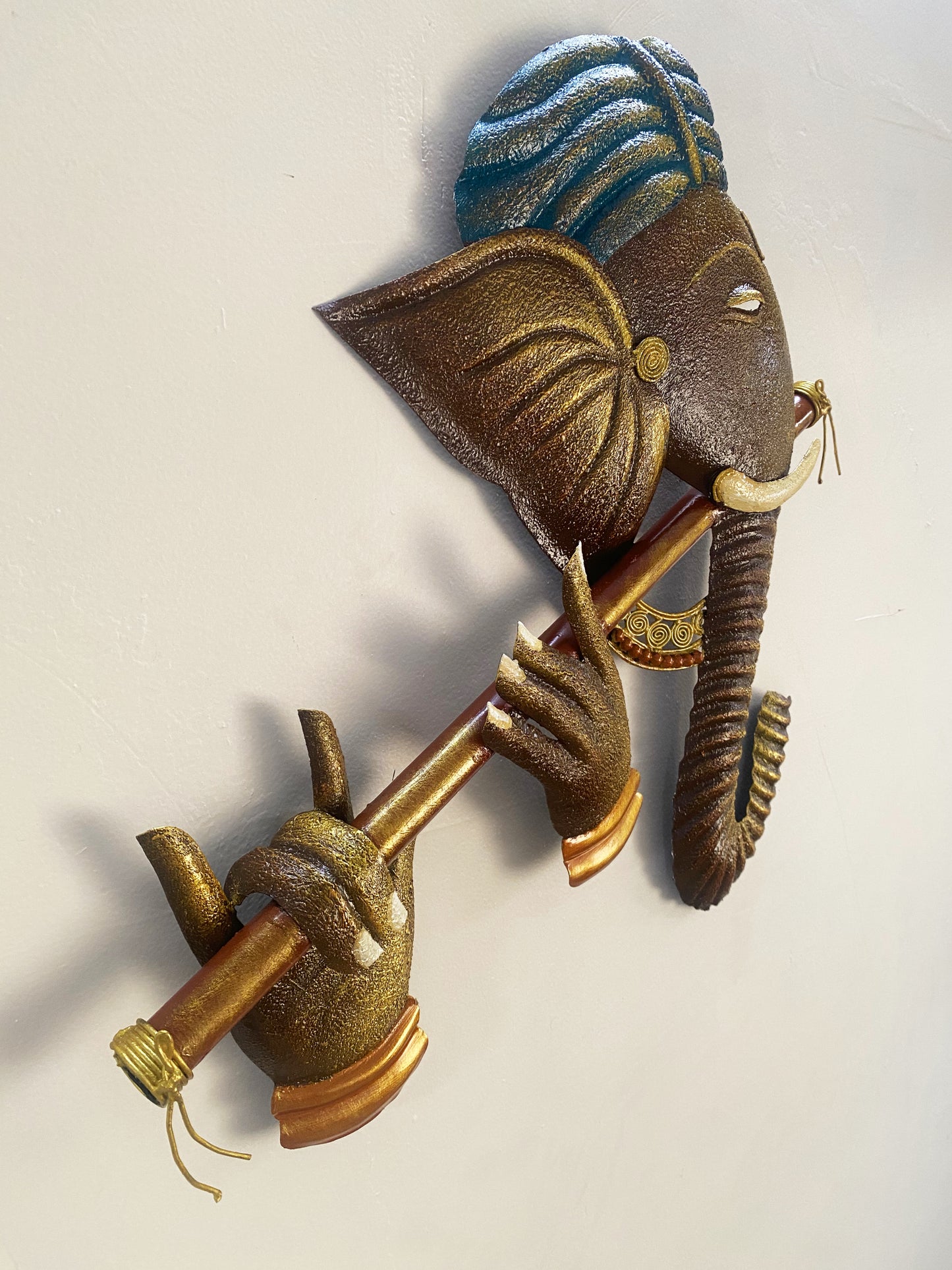 The Bombay Craft House™ Bansuri Ganesha Antique Metal Wall Art For Home Decor.